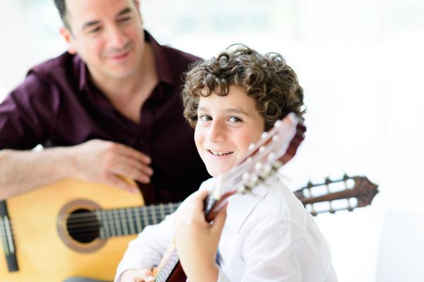Music Lessons for Children - guitar student with teacher