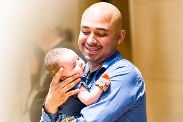 Early Childhood Education - father with newborn infant