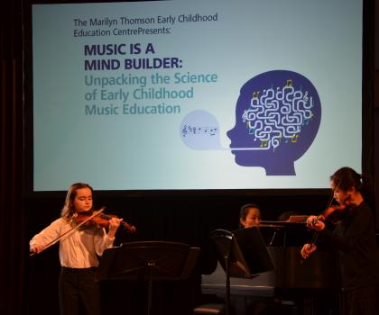 Students performing at Neuroscience Symposium
