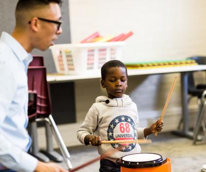 Boy playing percussion