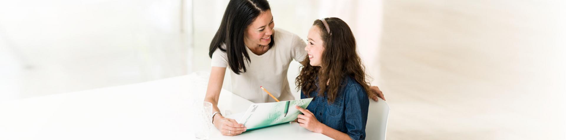 Testimonials - mother and daughter with theory book